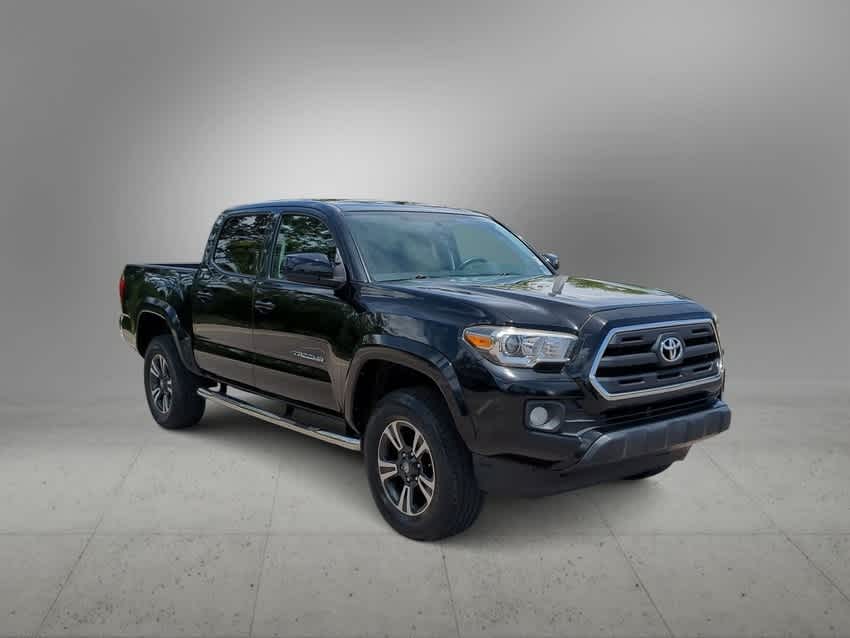 Used 2016 Toyota Tacoma SR5 with VIN 3TMAZ5CN0GM014678 for sale in New Port Richey, FL