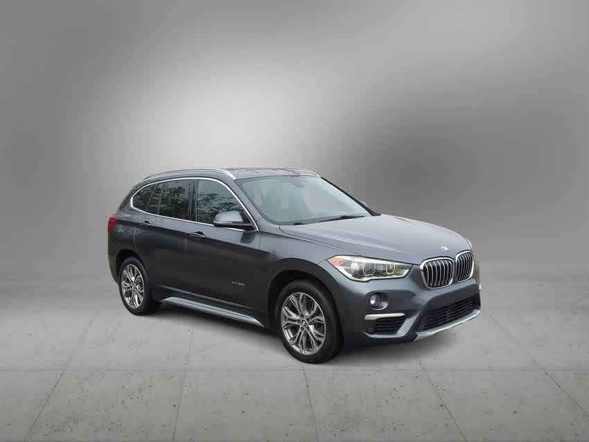 Used 2017 BMW X1 28i with VIN WBXHT3Z39H4A52410 for sale in New Port Richey, FL