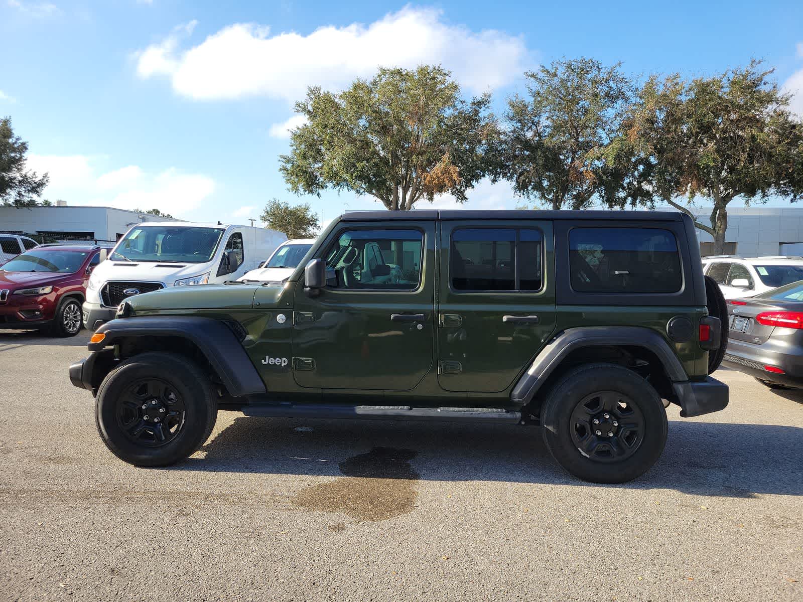 Used 2021 Jeep Wrangler Unlimited Sport with VIN 1C4HJXDN4MW554594 for sale in Wesley Chapel, FL