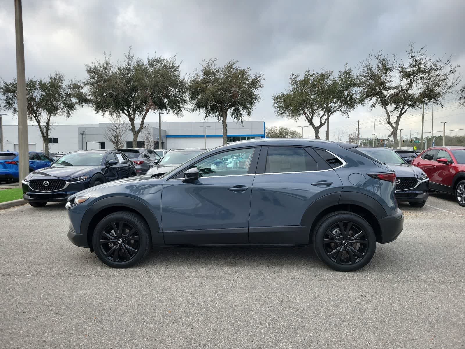 Used 2024 Mazda CX-30 Carbon Edition with VIN 3MVDMBCM0RM669961 for sale in Wesley Chapel, FL