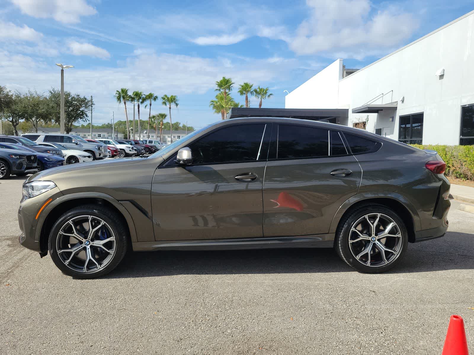 Used 2020 BMW X6 M50i with VIN 5UXCY8C03L9B13653 for sale in Wesley Chapel, FL