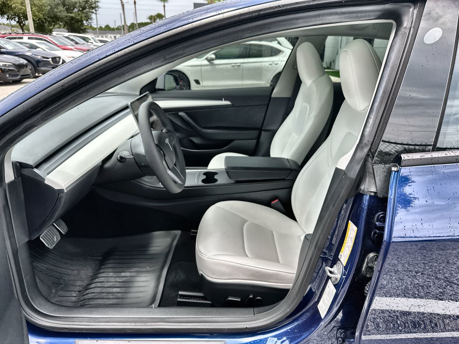 Used 2023 Tesla Model 3 Base with VIN 5YJ3E1EA2PF571104 for sale in Wesley Chapel, FL