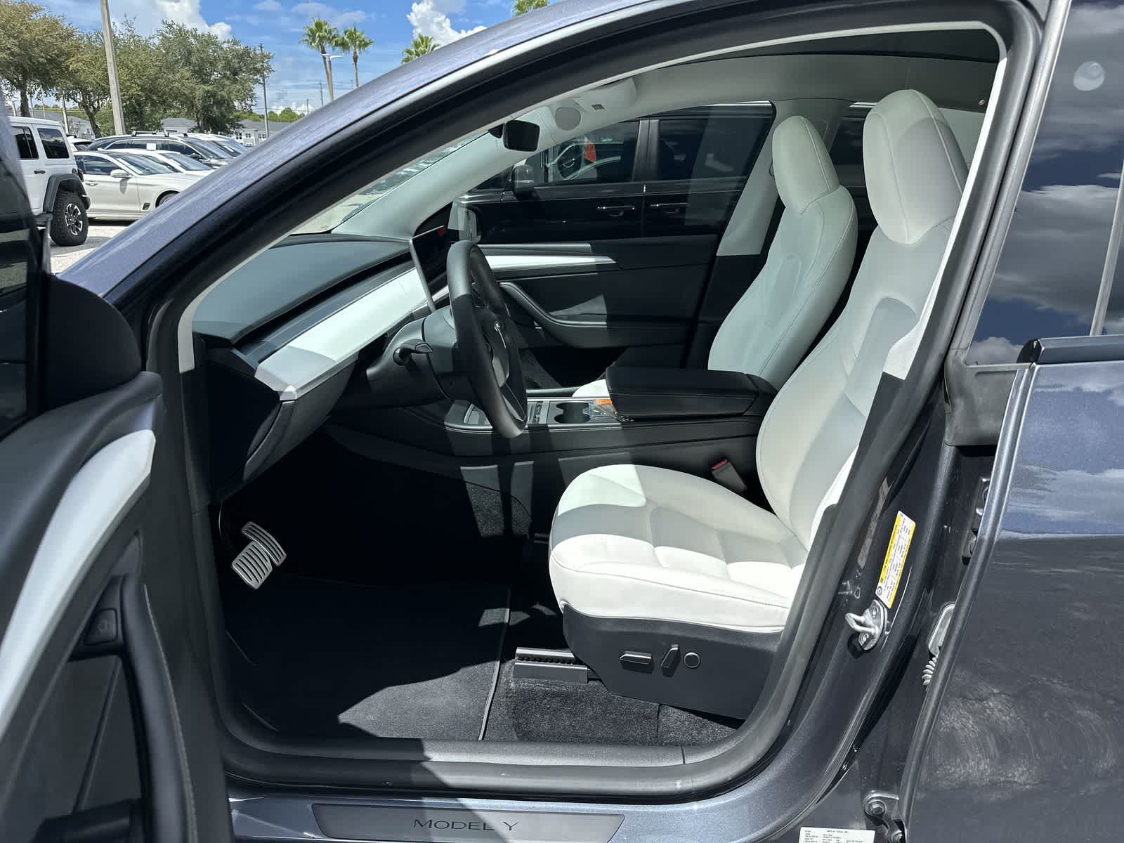 Used 2023 Tesla Model Y Performance with VIN 7SAYGDEFXPF825397 for sale in Wesley Chapel, FL