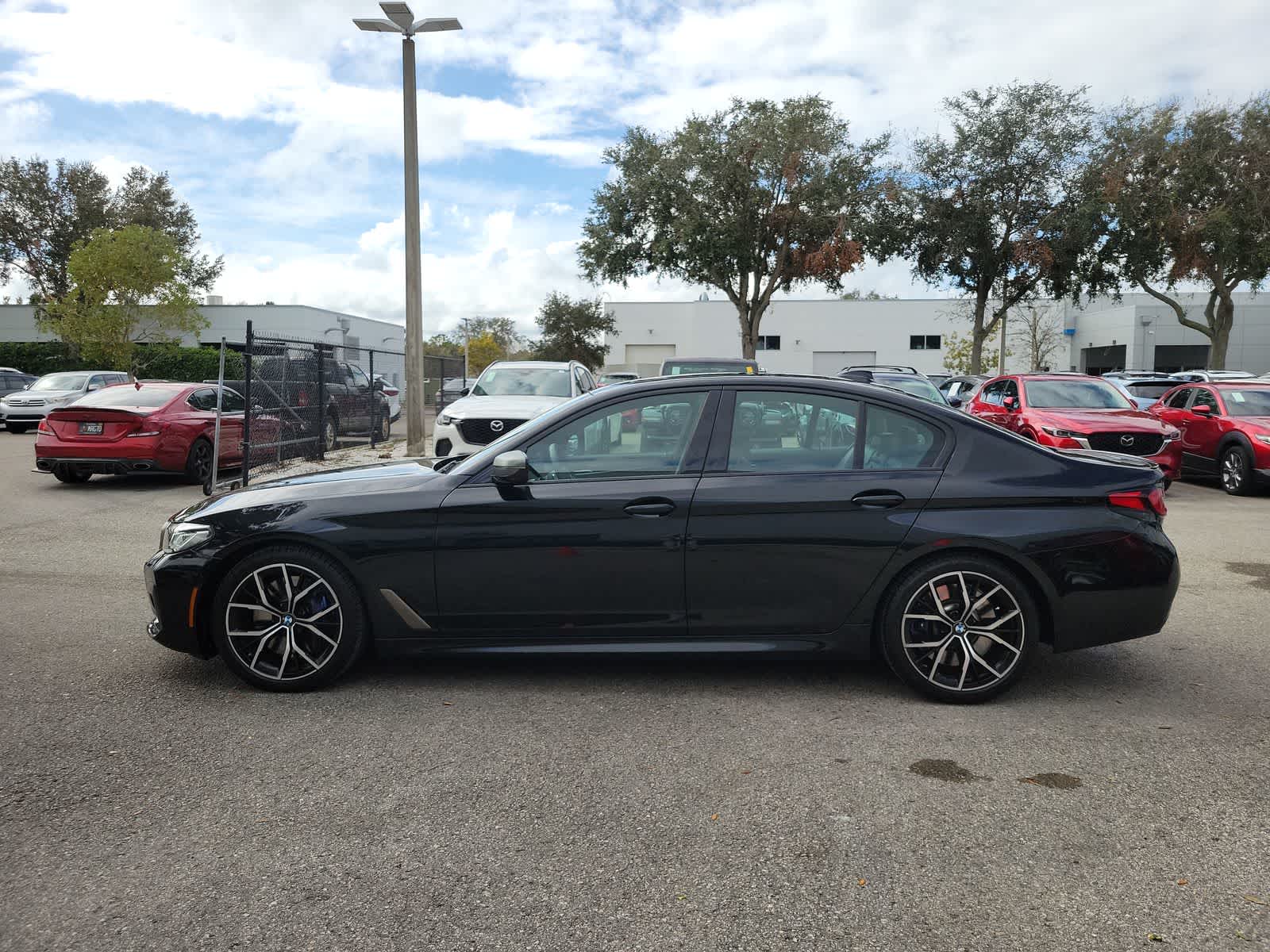 Used 2021 BMW 5 Series M550i with VIN WBA13BK01MCH51729 for sale in Wesley Chapel, FL