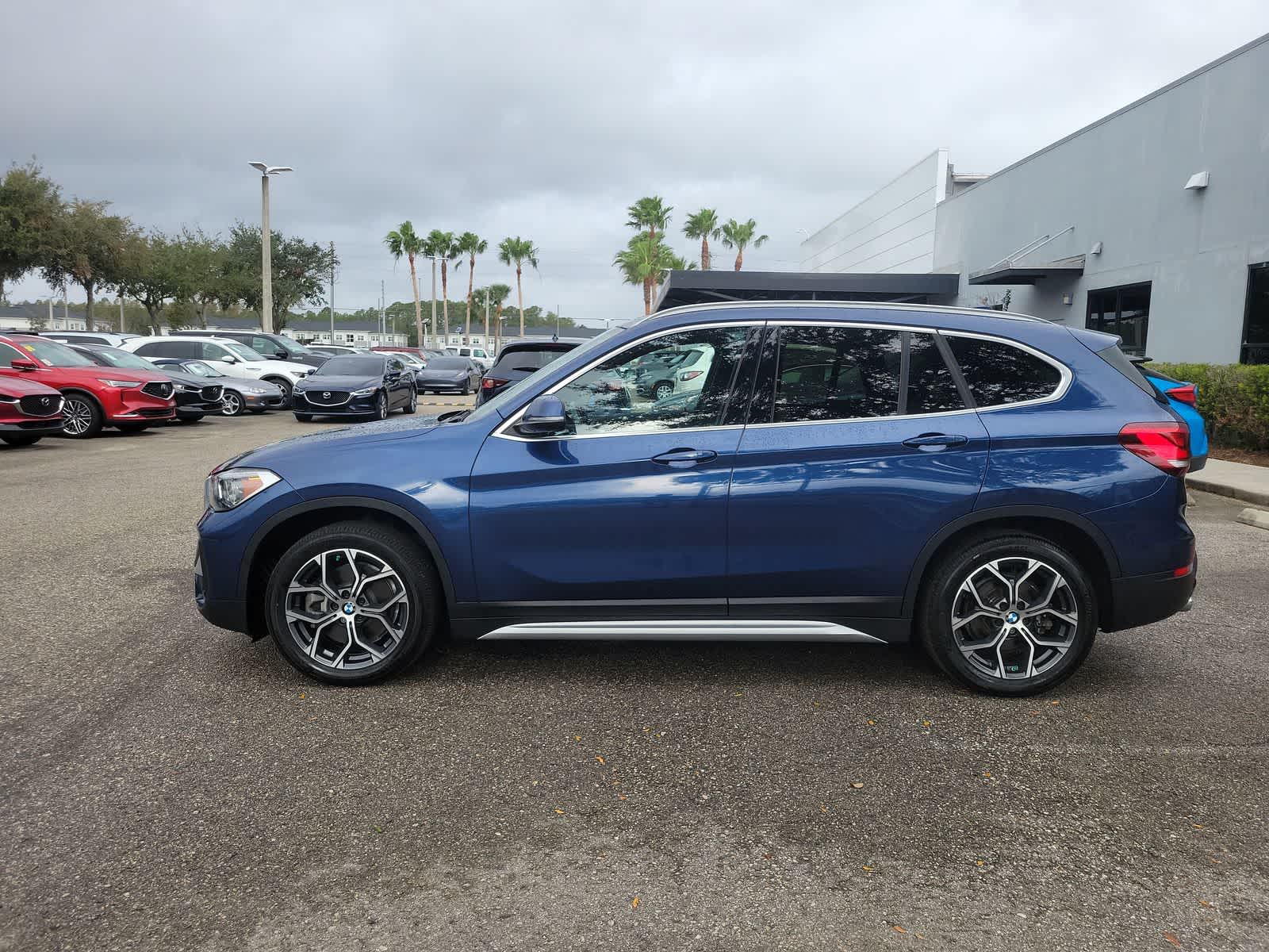 Used 2021 BMW X1 28i with VIN WBXJG9C07M3M66032 for sale in Wesley Chapel, FL