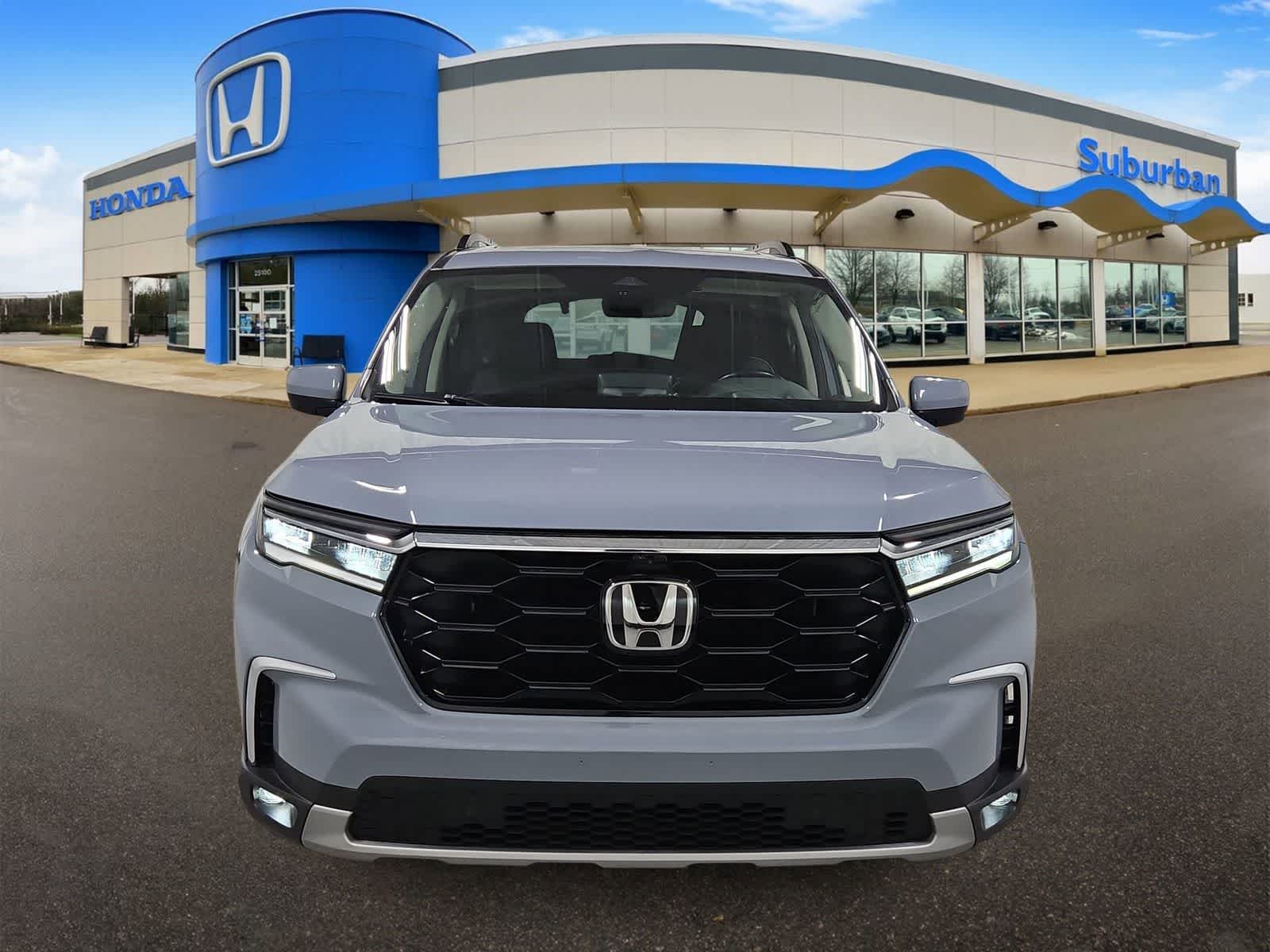 View vehicle photo 3