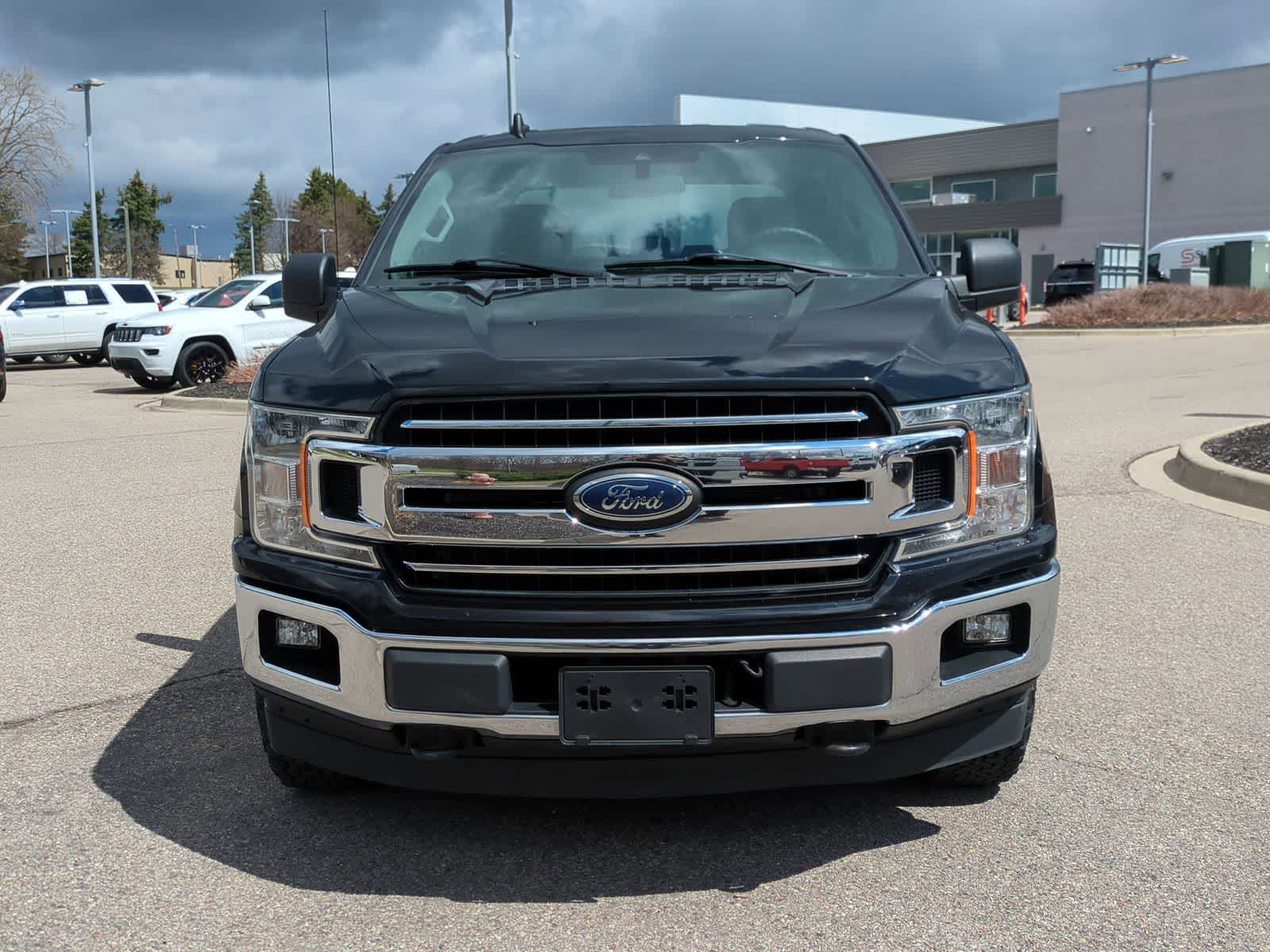 View vehicle photo 3