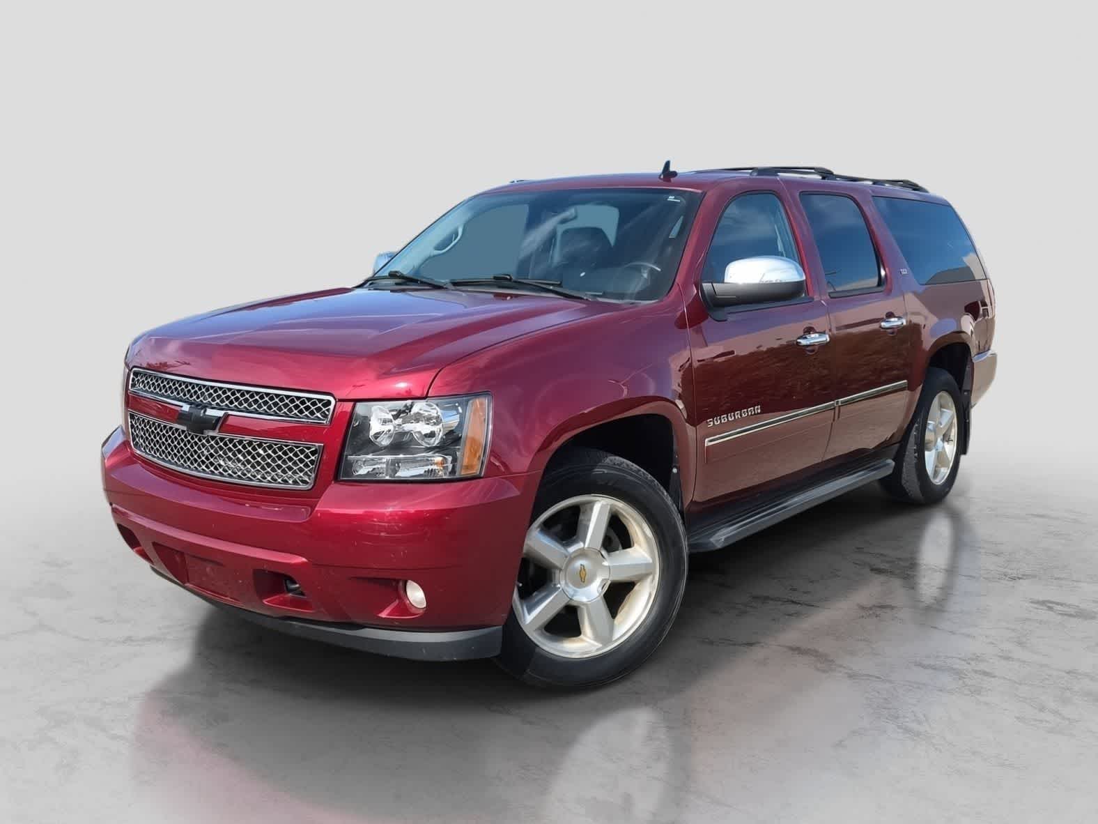 Red Jewel Tintcoat 2010 Chevrolet Suburban SUV / Crossover Four-Wheel Drive 6-Speed Automatic
