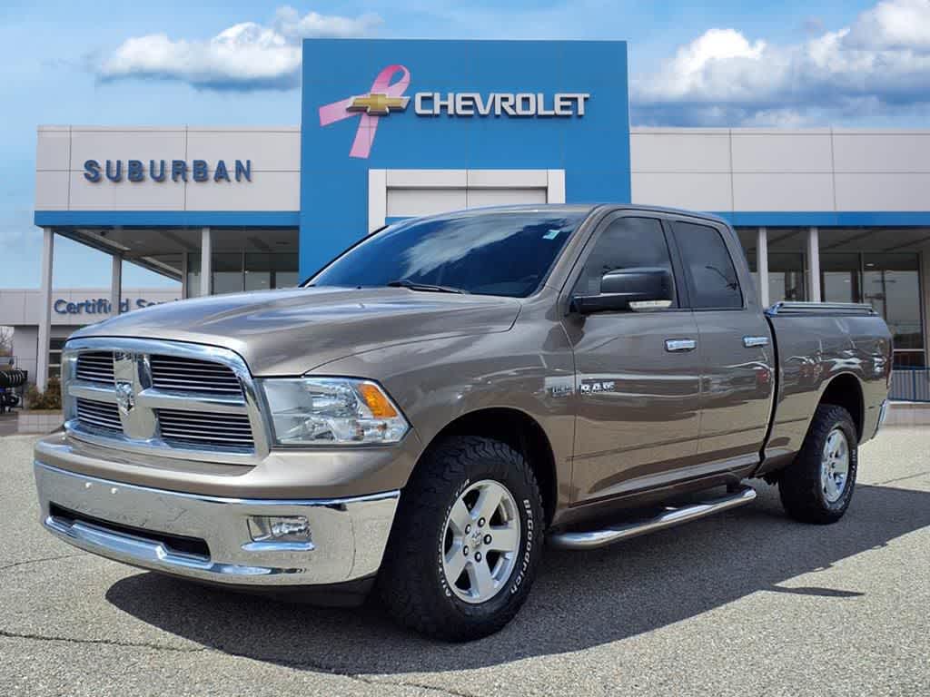 Brown (Austin Tan Pearl) 2010 Dodge RAM 1500 SLT Quad Cab 4WD Pickup Truck Four-Wheel Drive 5-Speed Automatic