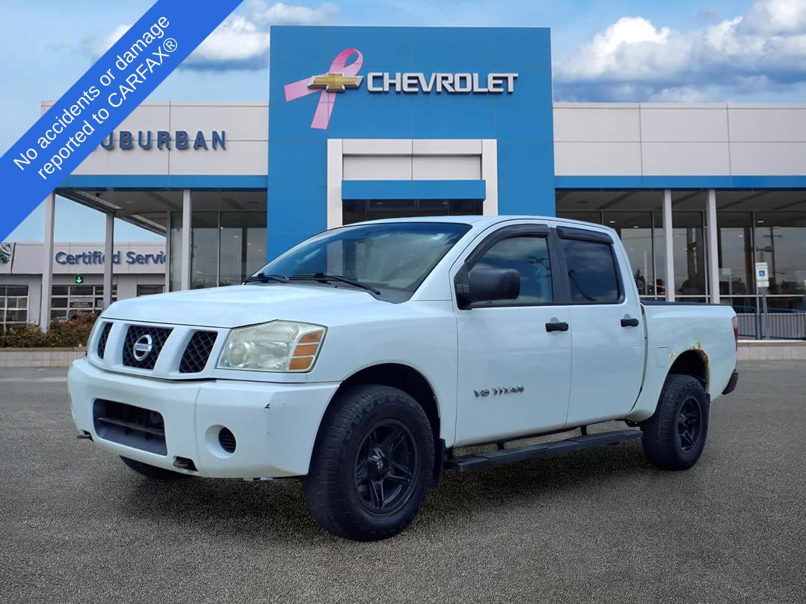 White 2006 Nissan Titan Pickup Truck Four-Wheel Drive 5-Speed Automatic