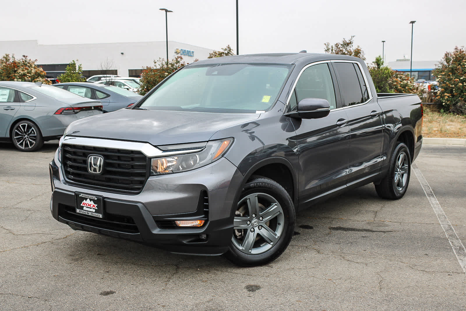 Gray (Modern Steel Metallic) 2023 Honda Ridgeline RTL AWD Pickup Truck All-Wheel Drive 9-Speed Automatic