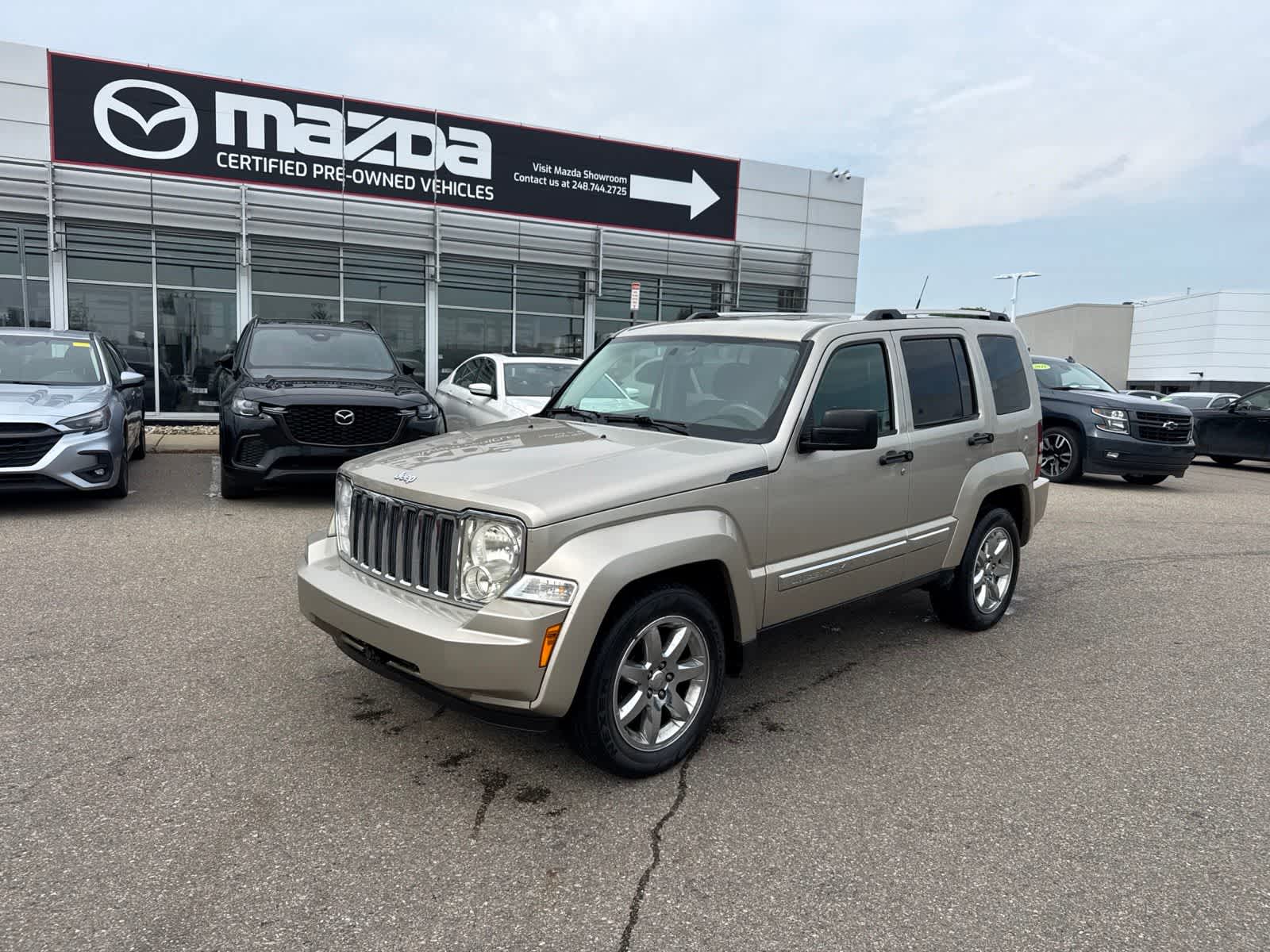 Light Sandstone Metallic 2011 Jeep Liberty SUV / Crossover Four-Wheel Drive 4-Speed Automatic