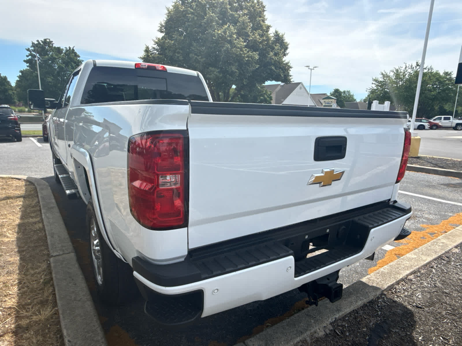 2016 Chevrolet Silverado 2500HD LTZ - Summit White exterior view 4