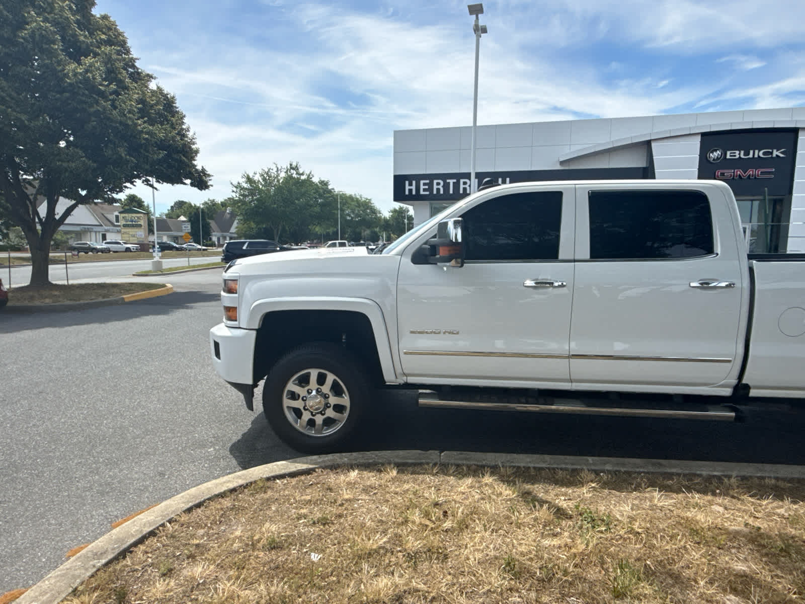 2016 Chevrolet Silverado 2500HD LTZ - Summit White exterior view 3