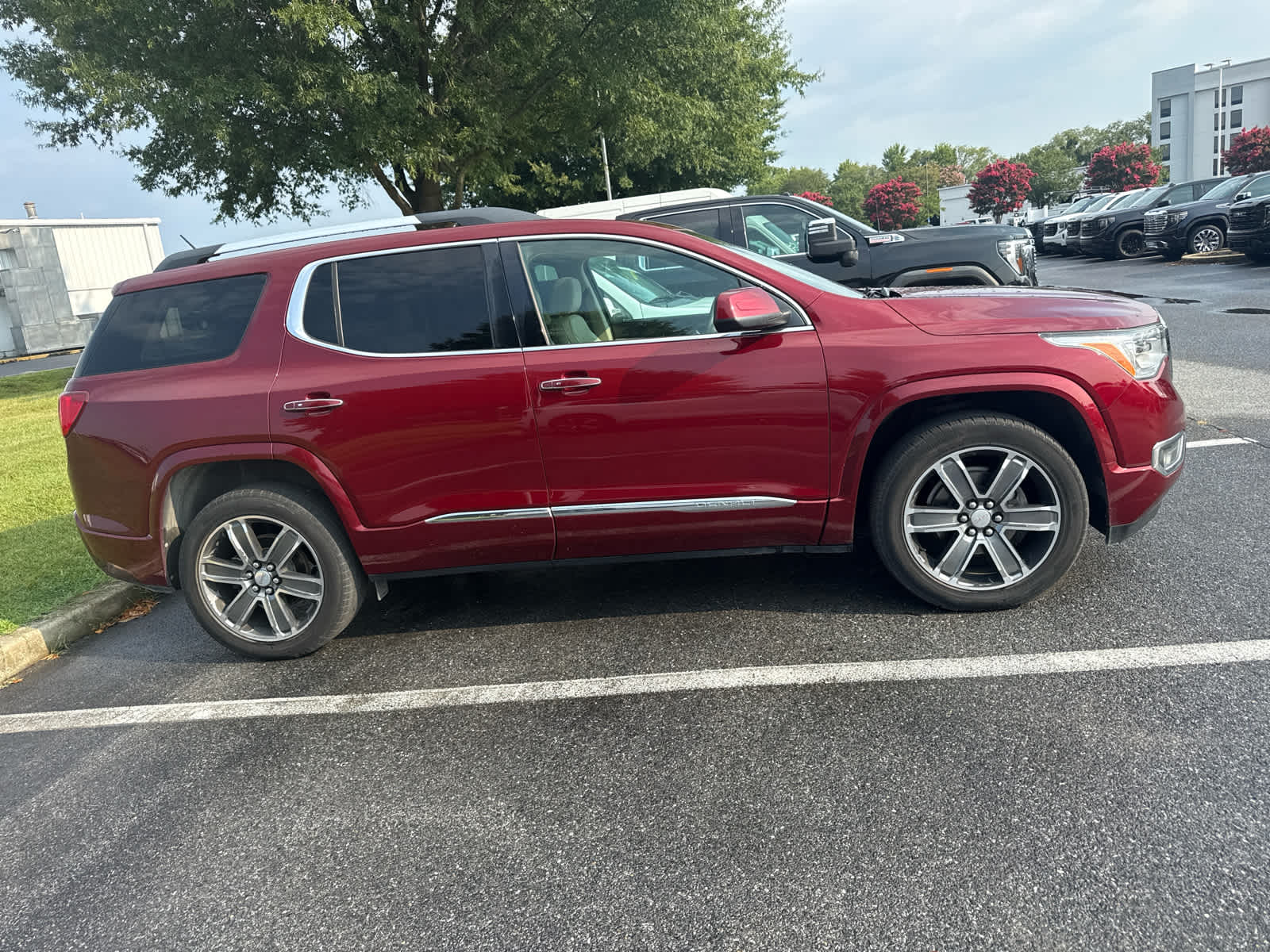 2017 GMC Acadia Denali - Crimson Red Tintcoat exterior view 2