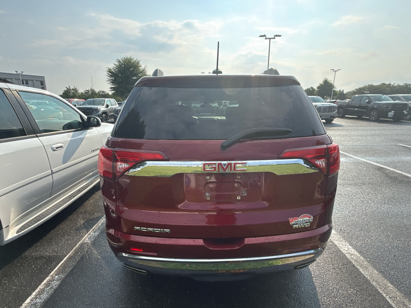 2017 GMC Acadia Denali - Crimson Red Tintcoat exterior view 4