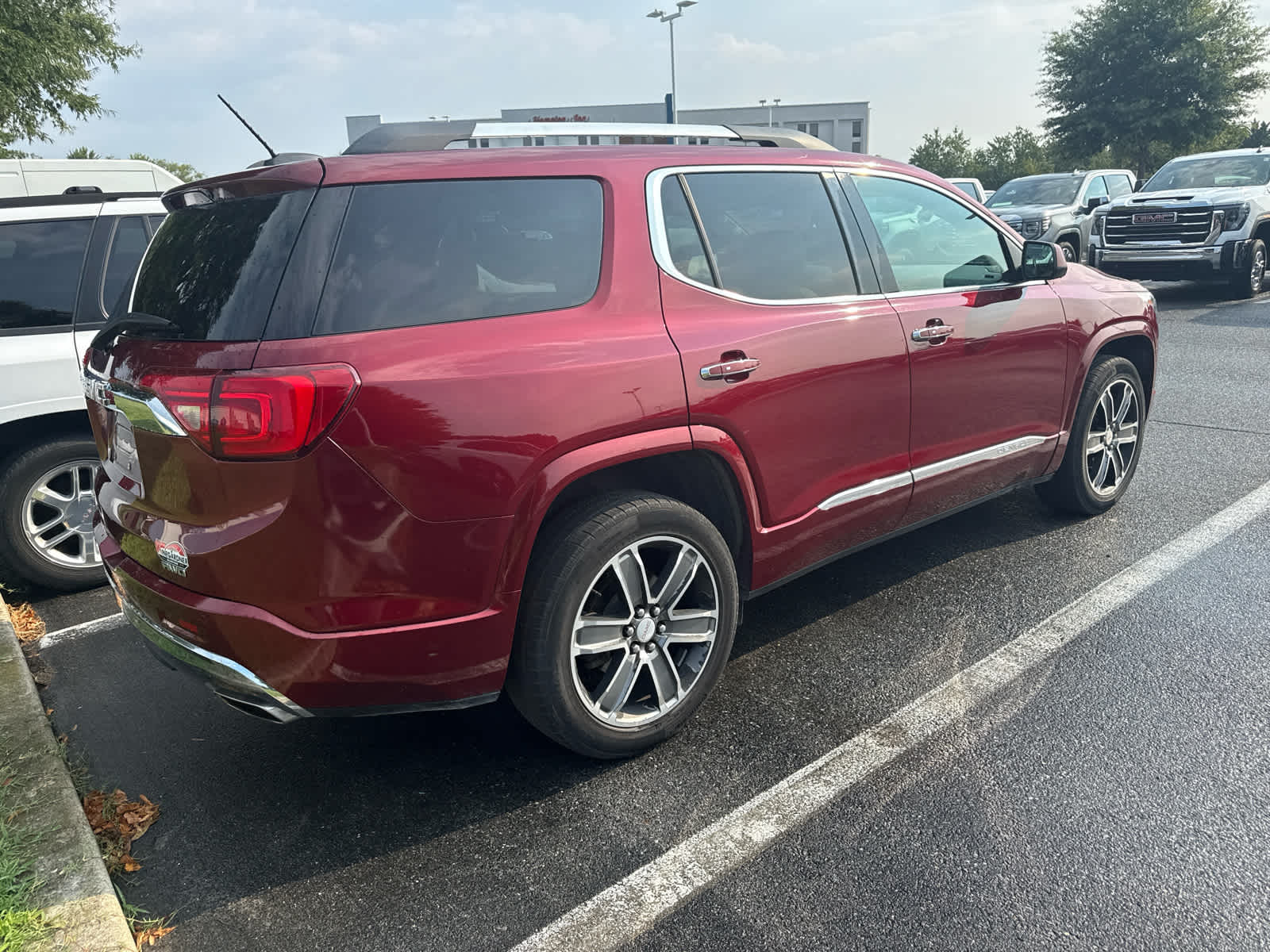 2017 GMC Acadia Denali - Crimson Red Tintcoat exterior view 3