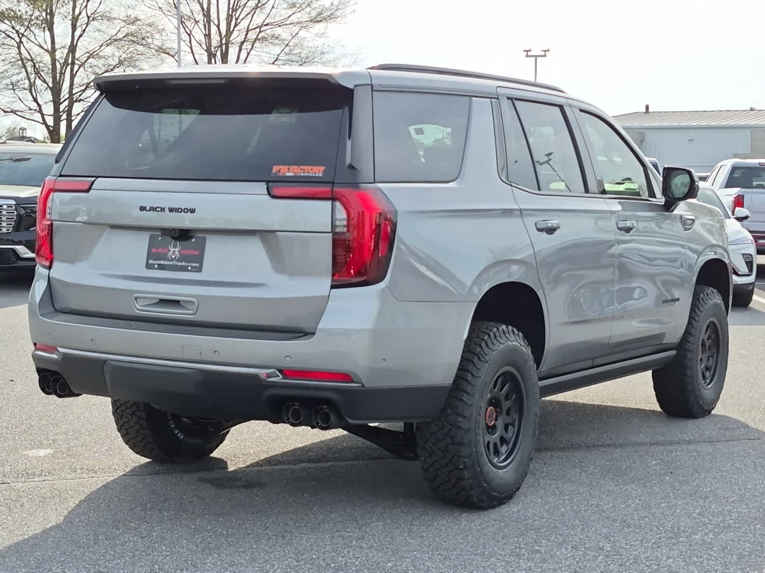 2026 GMC Yukon AT4 - Sterling Metallic exterior view 3