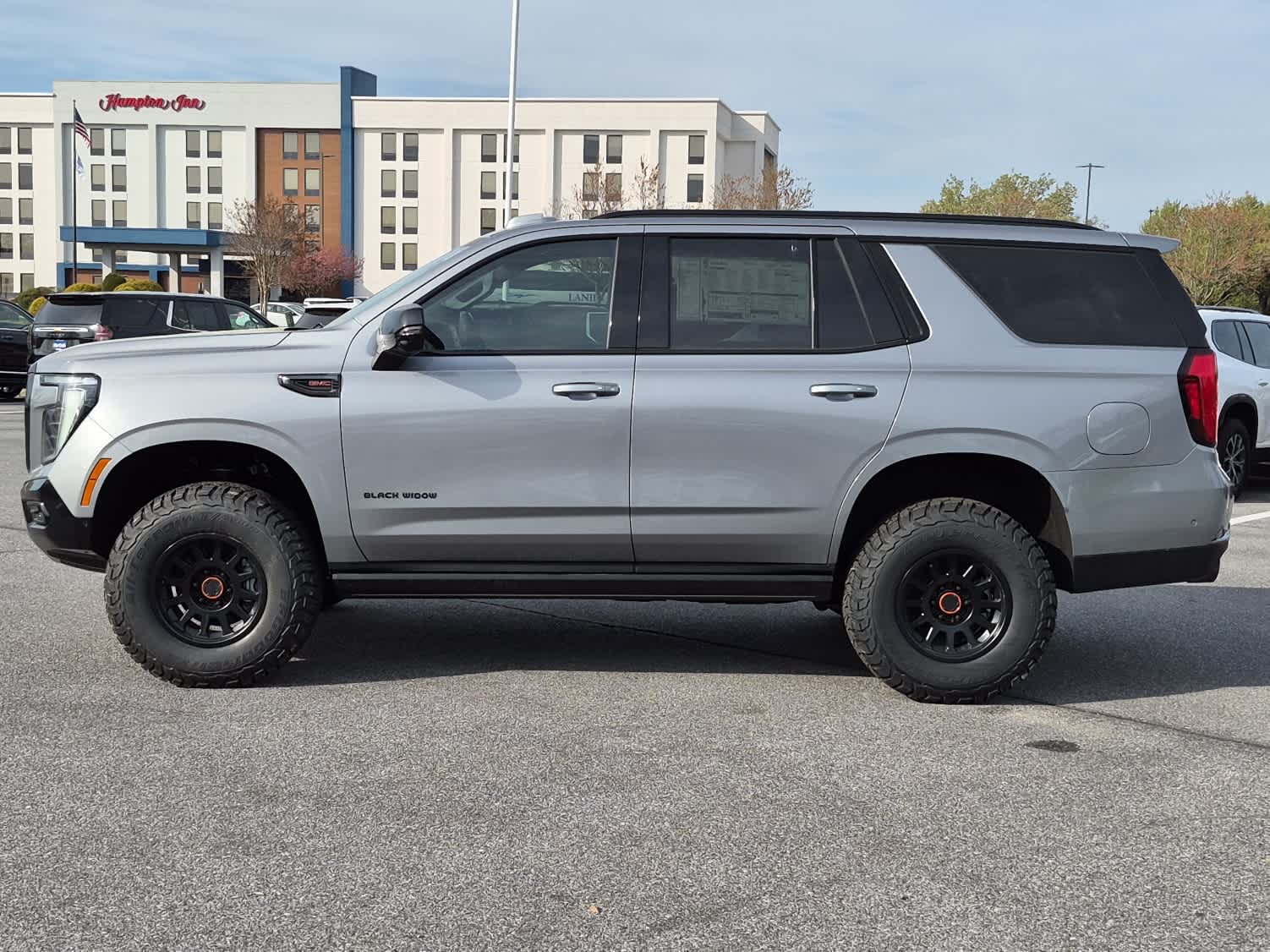 2026 GMC Yukon AT4 - Sterling Metallic exterior view 5