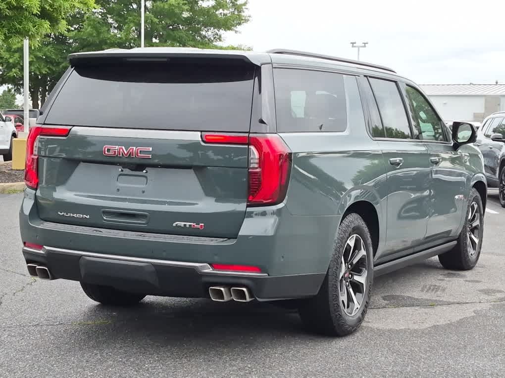 2026 GMC Yukon XL AT4 - Midnight Pine exterior view 3