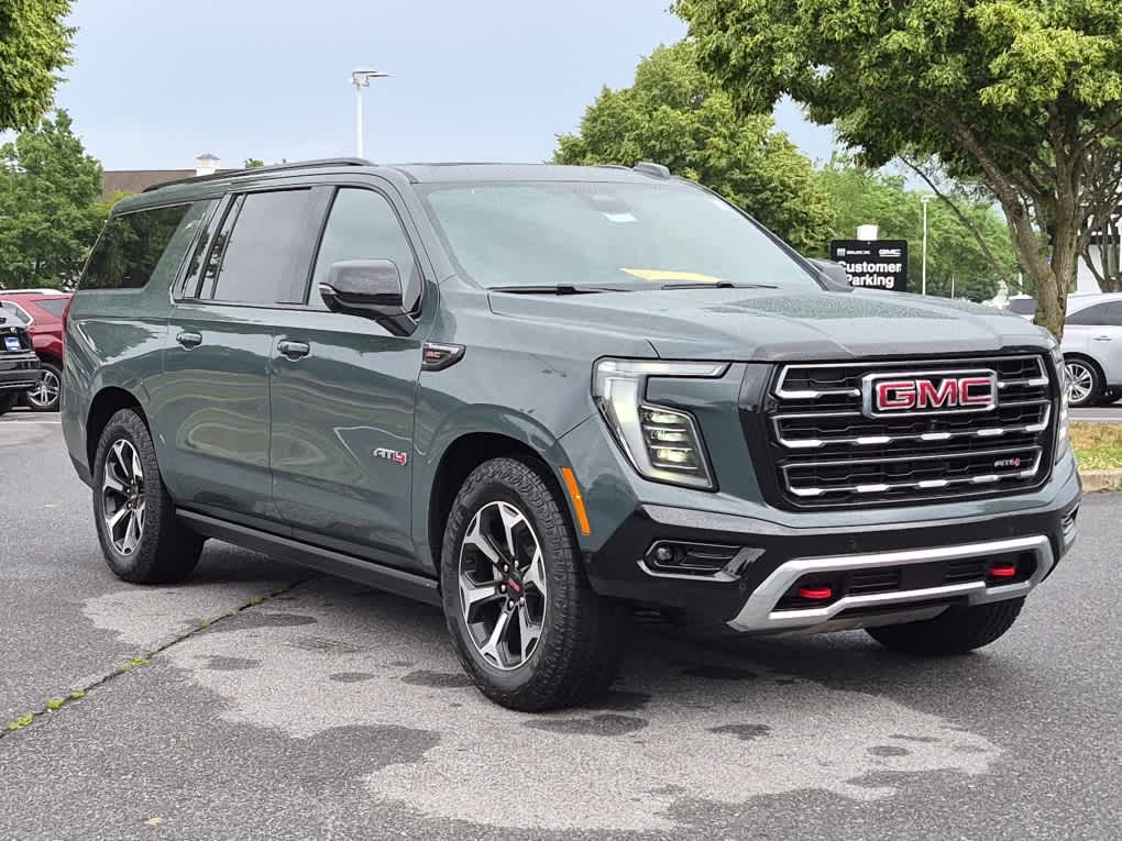 2026 GMC Yukon XL AT4 - Midnight Pine exterior view 2
