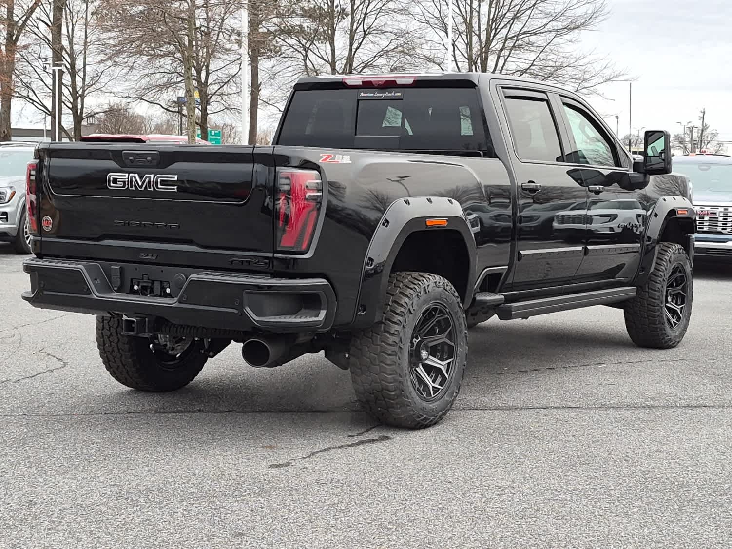 2026 GMC Sierra 2500HD AT4 - Onyx Black exterior view 3