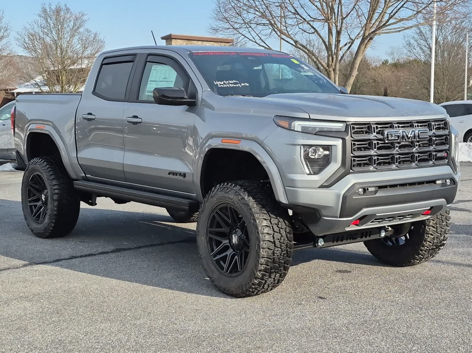 2026 GMC Canyon 4WD AT4 - Sterling Metallic exterior view 2