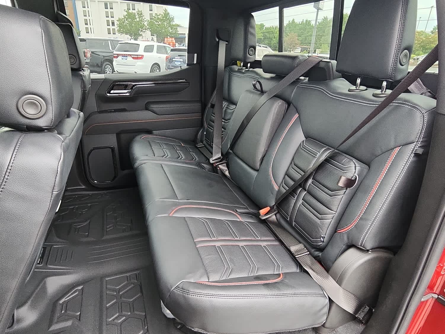 2025 GMC Sierra 1500 AT4 - Volcanic Red Tintcoat exterior view 7