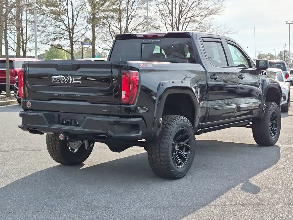 2026 GMC Sierra 1500 AT4 - Onyx Black exterior view 3
