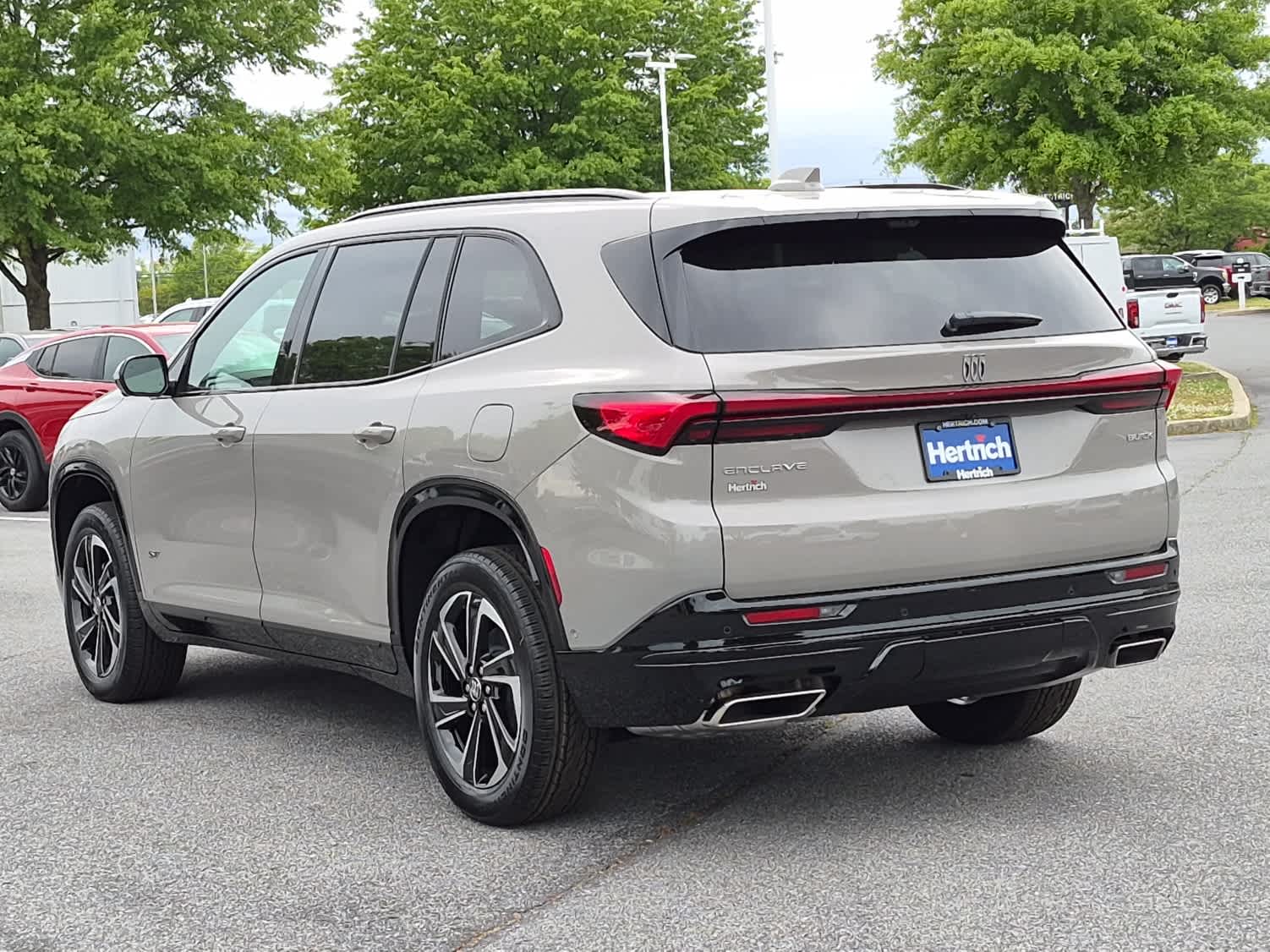 2026 Buick Enclave Sport Touring - Stone Metallic exterior view 4