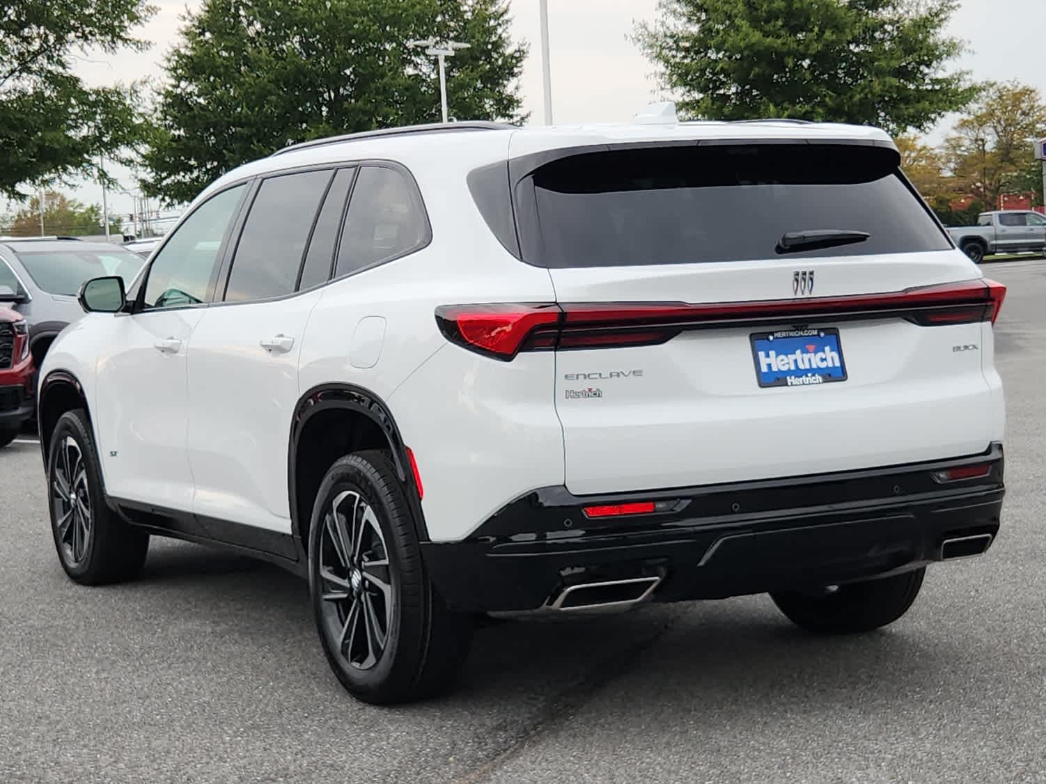 2026 Buick Enclave Sport Touring - Summit White exterior view 4