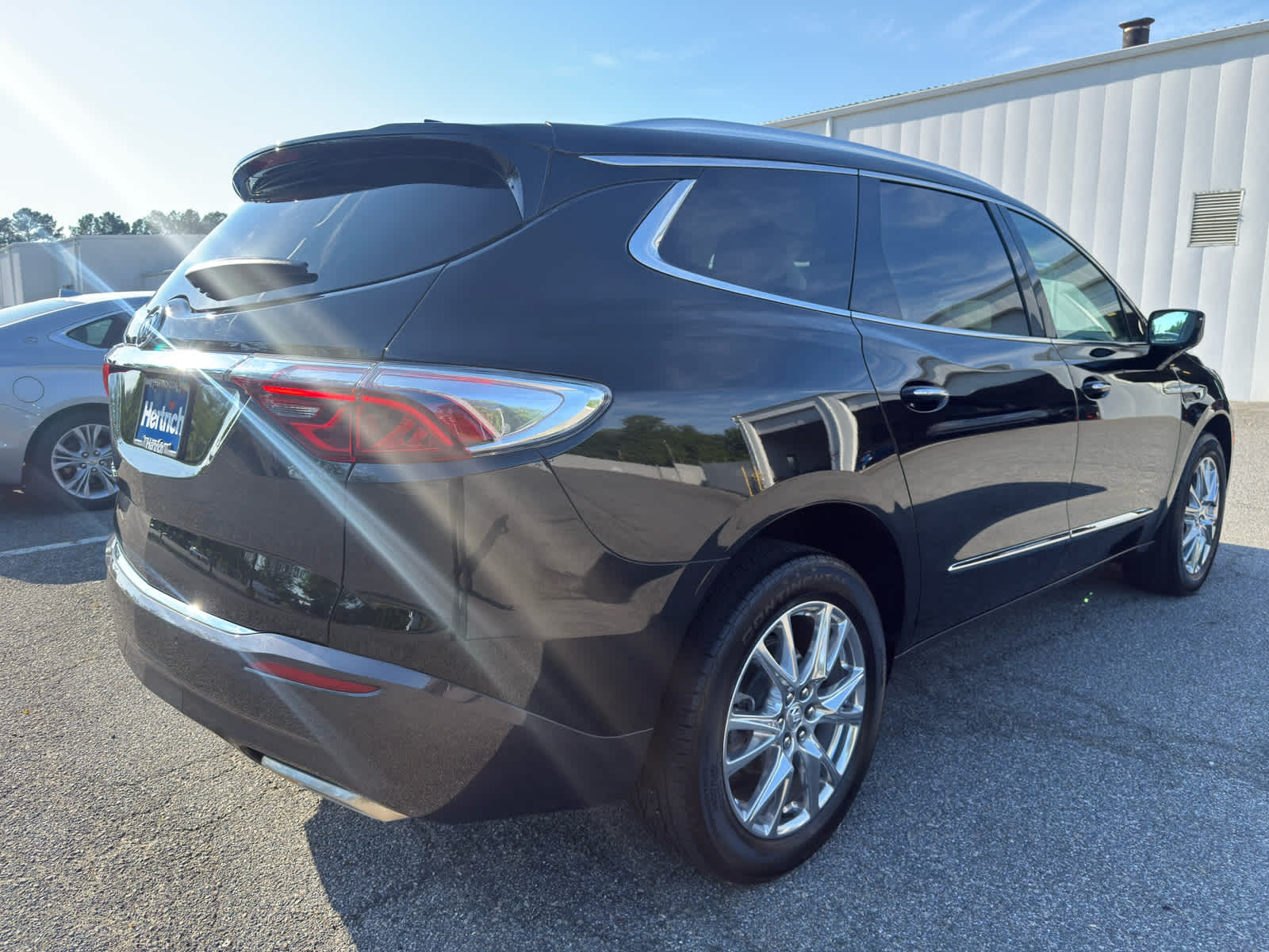 2023 Buick Enclave Essence - Ebony Twilight Metallic exterior view 5