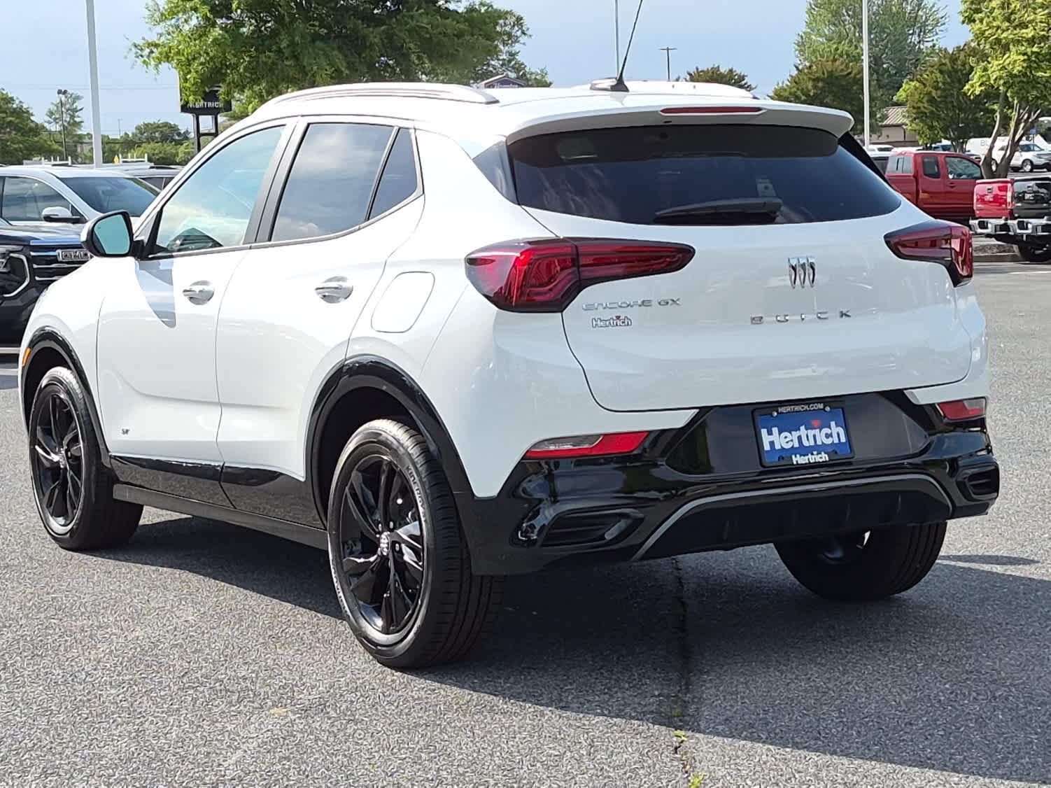 2026 Buick Encore GX Sport Touring - Summit White exterior view 4