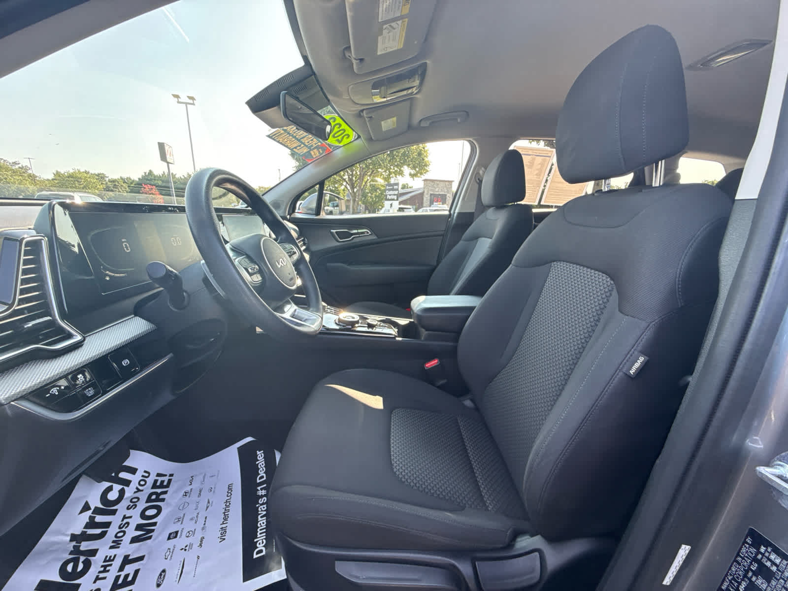 2023 Kia Sportage Hybrid LX - Steel Gray exterior view 12
