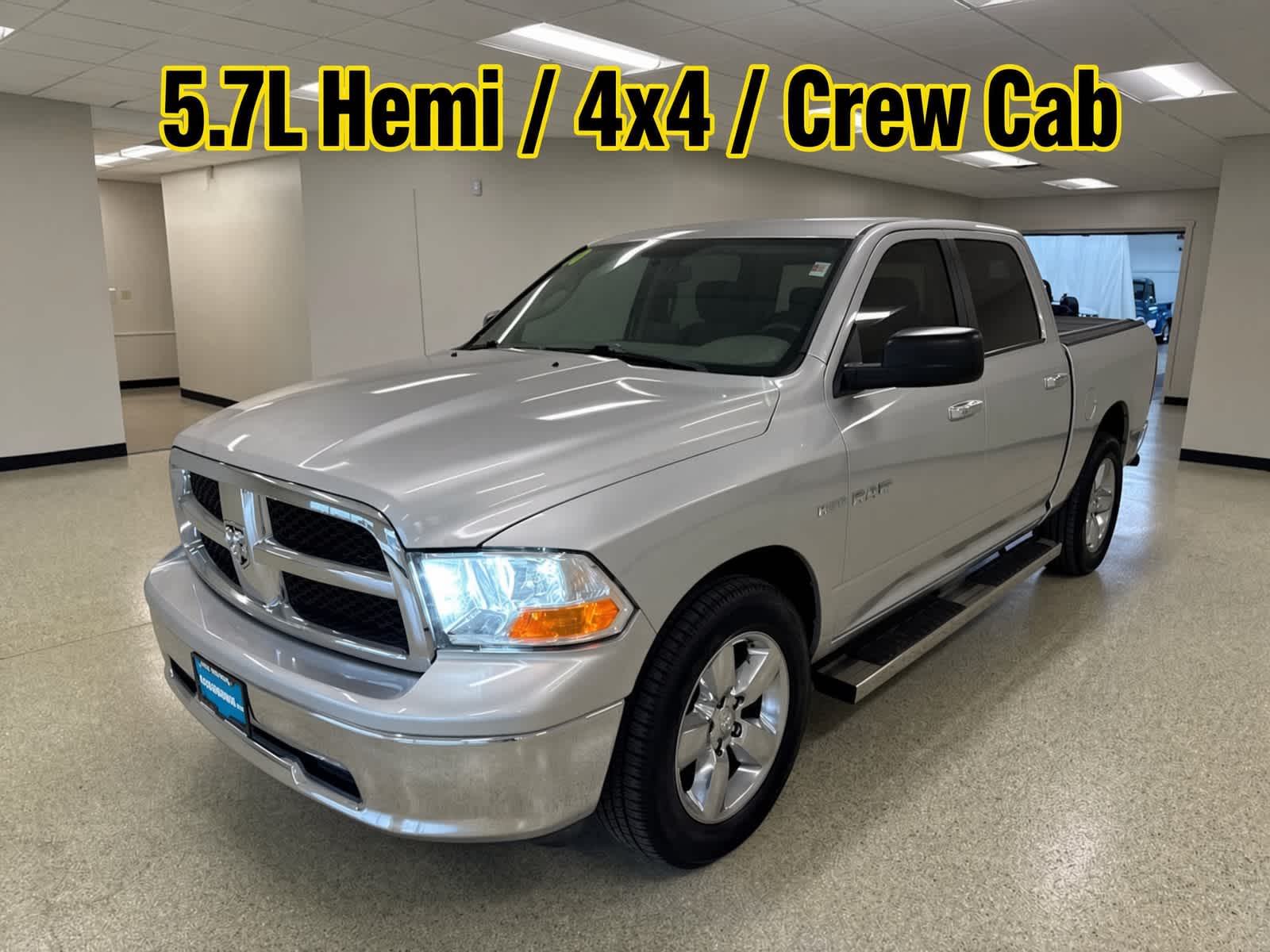 Bright Silver Metallic 2010 Dodge RAM 1500 Pickup Truck Four-Wheel Drive 5-Speed Automatic