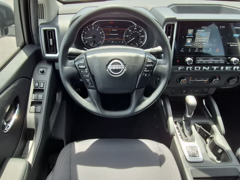 2026 Nissan Frontier SV - Glacier White exterior view 8