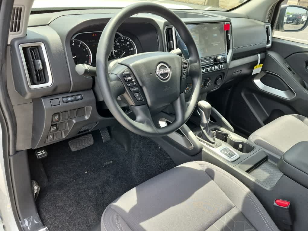 2026 Nissan Frontier SV - Glacier White exterior view 11