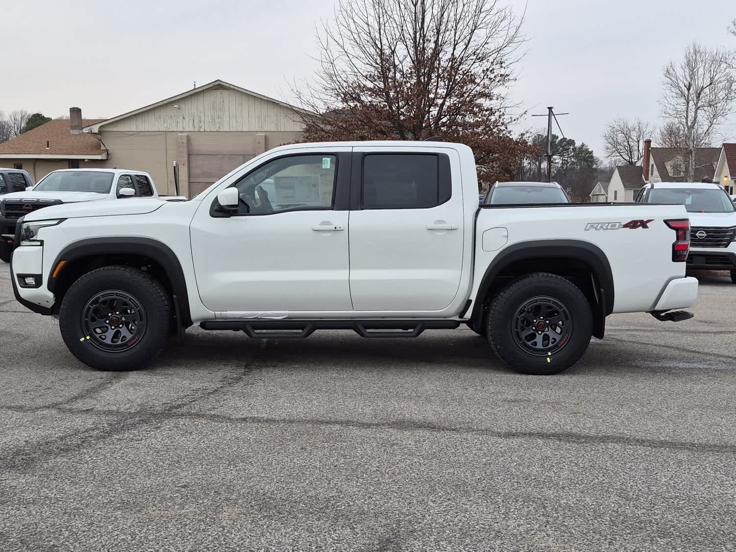 2026 Nissan Frontier PRO-4X - Glacier White exterior view 5
