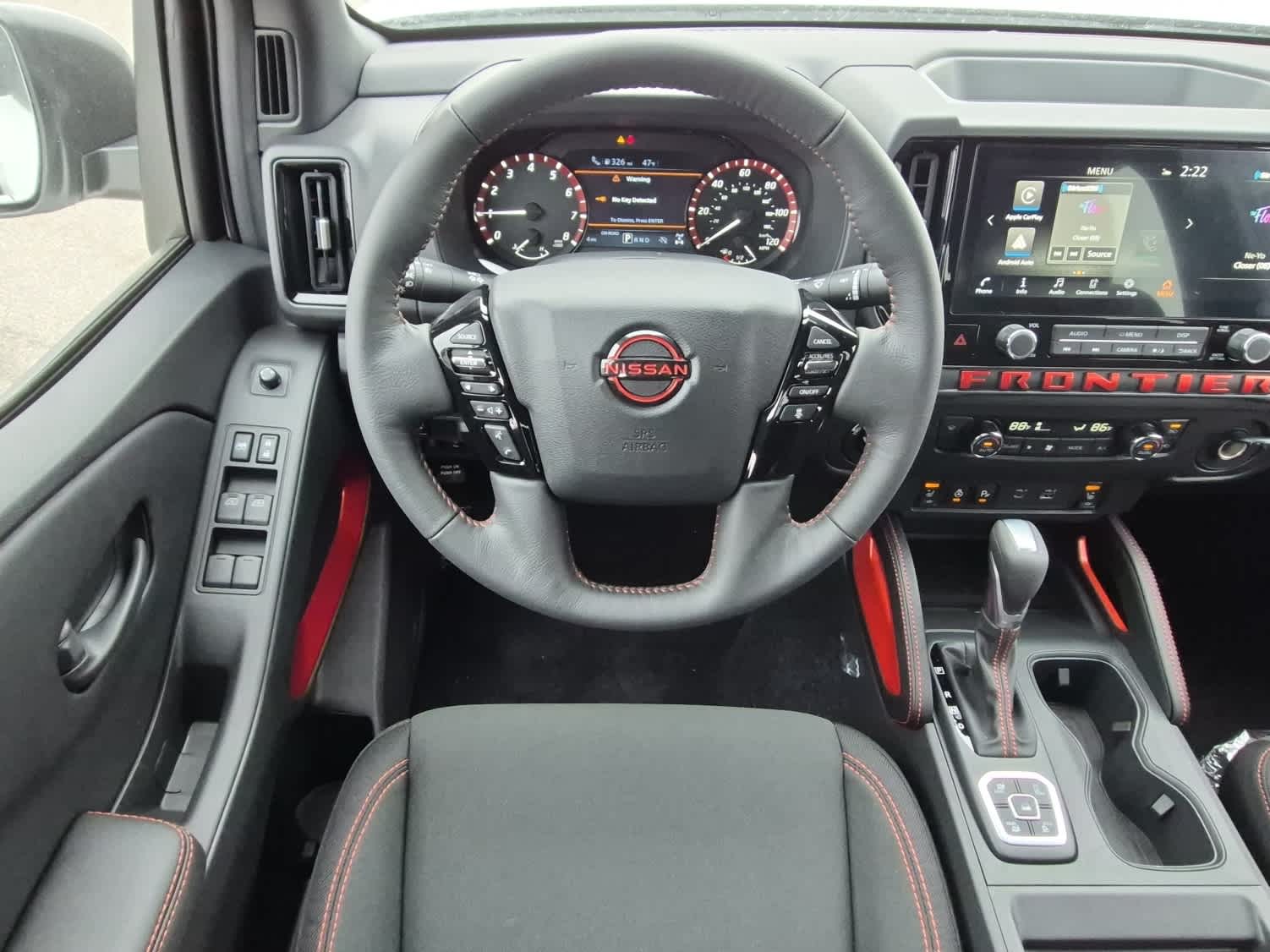2026 Nissan Frontier PRO-4X - Glacier White exterior view 8