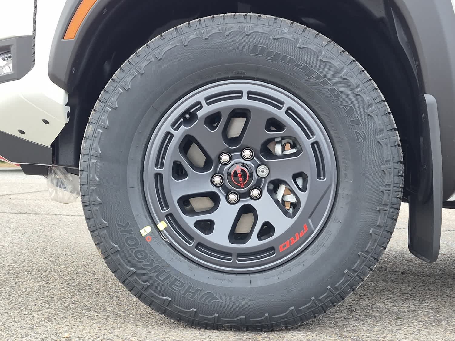 2026 Nissan Frontier PRO-4X - Glacier White exterior view 6