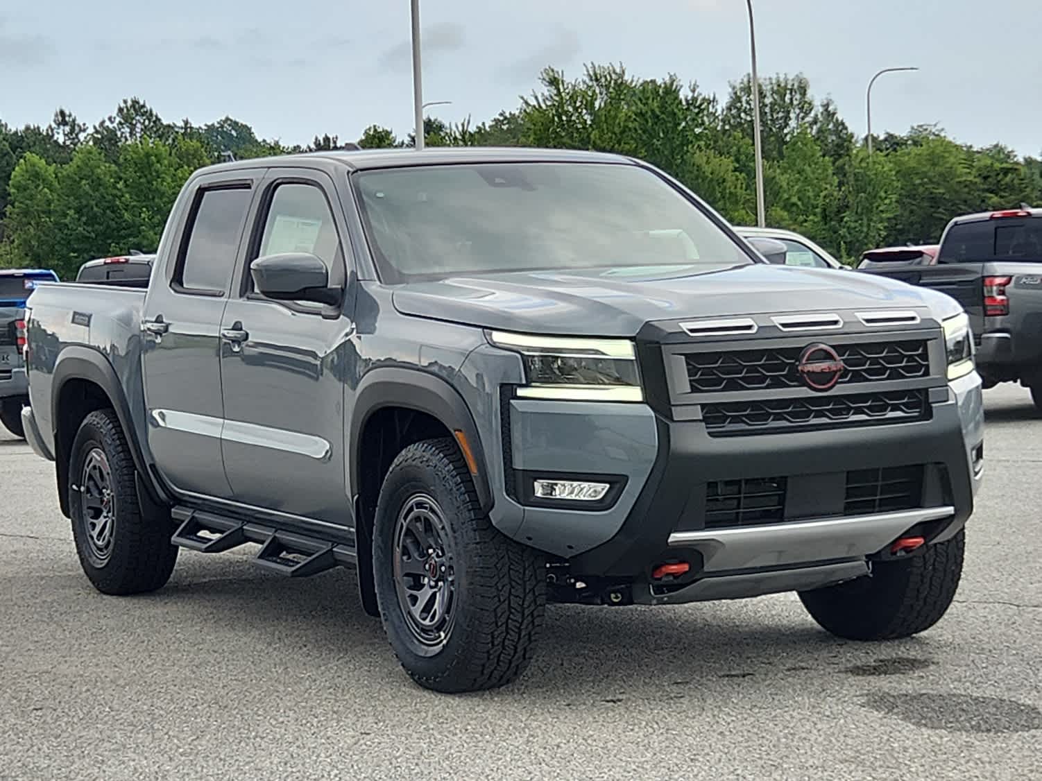 2025 Nissan Frontier PRO-4X - Boulder Gray Pearl exterior view 2