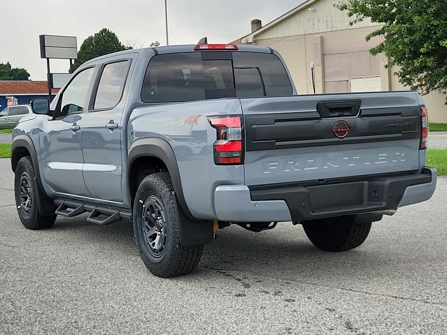 2025 Nissan Frontier PRO-4X - Boulder Gray Pearl exterior view 4