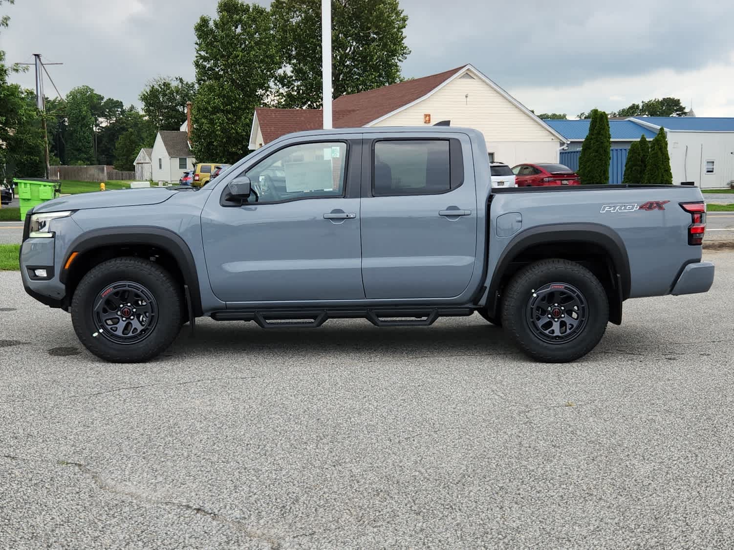 2025 Nissan Frontier PRO-4X - Boulder Gray Pearl exterior view 5