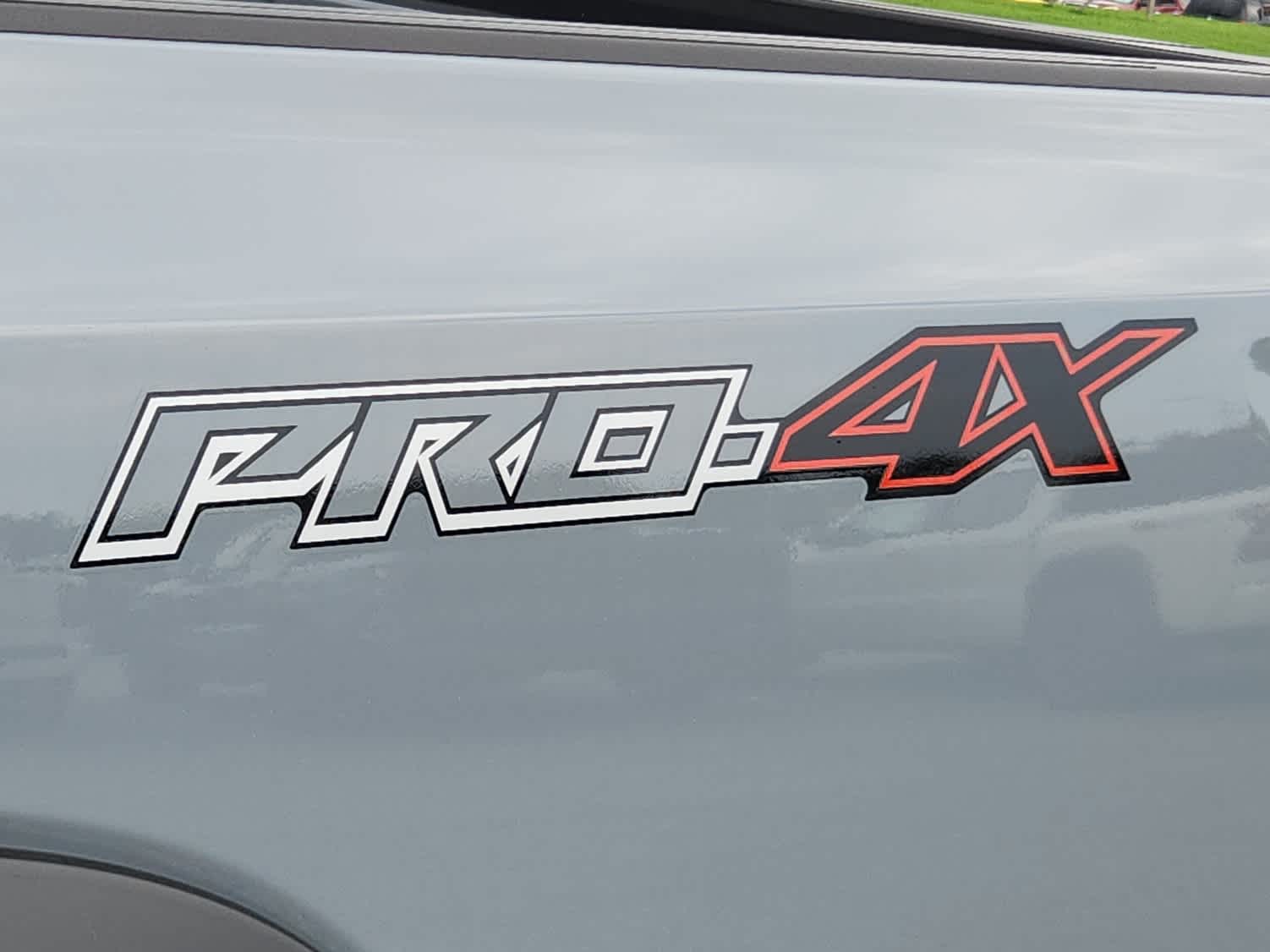 2025 Nissan Frontier PRO-4X - Boulder Gray Pearl exterior view 17