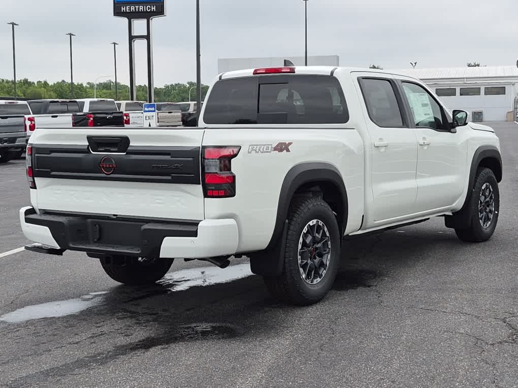 2026 Nissan Frontier PRO-4X - Glacier White exterior view 3