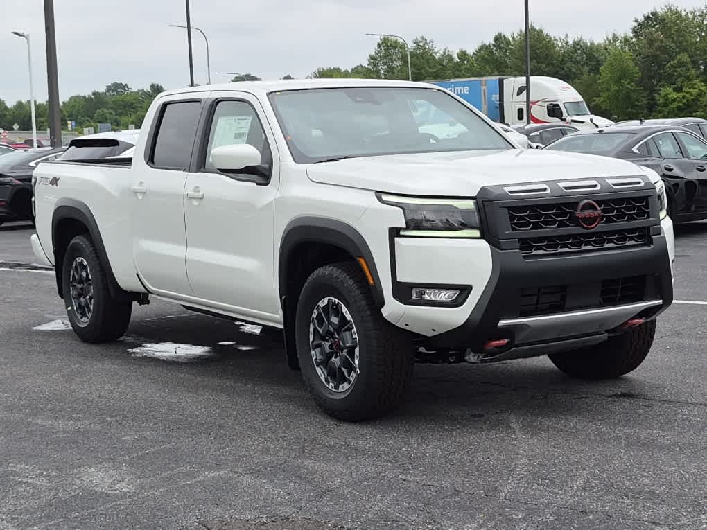 2026 Nissan Frontier PRO-4X - Glacier White exterior view 2