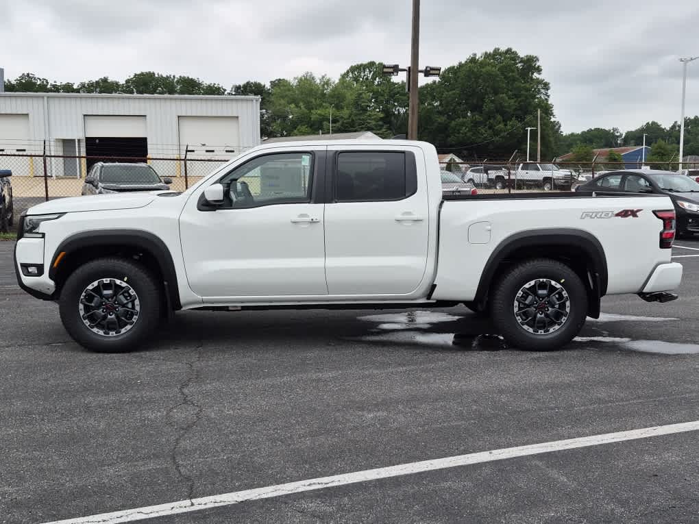 2026 Nissan Frontier PRO-4X - Glacier White exterior view 5