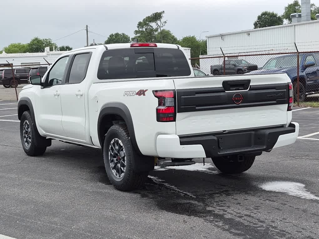 2026 Nissan Frontier PRO-4X - Glacier White exterior view 4