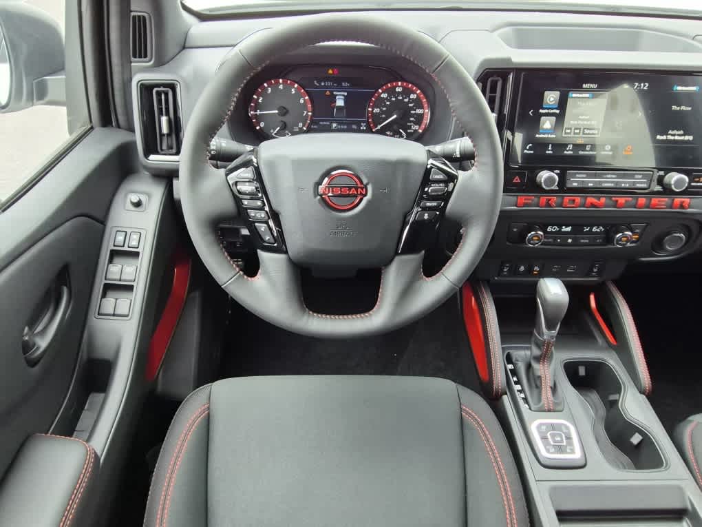 2026 Nissan Frontier PRO-4X - Glacier White exterior view 8
