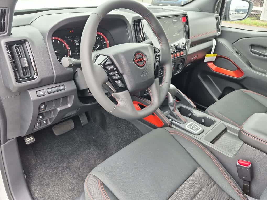 2026 Nissan Frontier PRO-4X - Glacier White exterior view 11